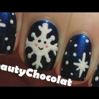 Коледни нокти със снежинки